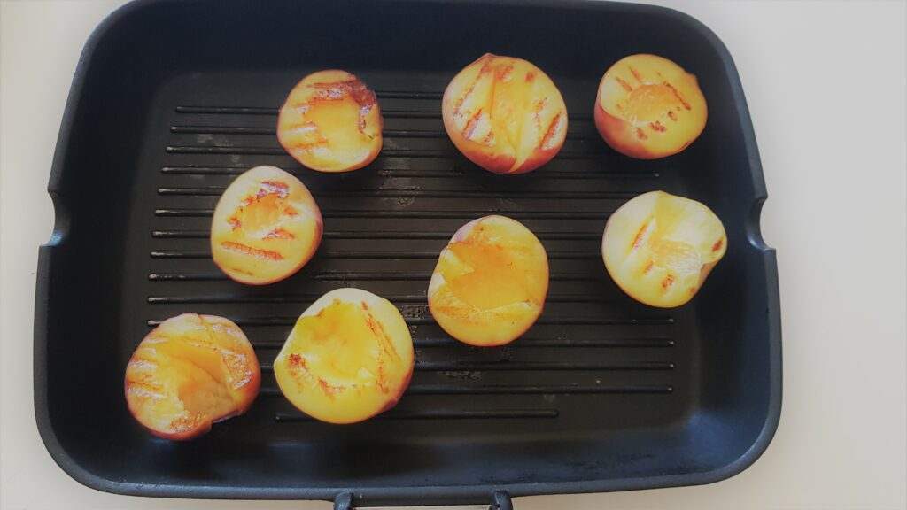 Baked Dulce de Leche and Peach with Coconut grill the peaches