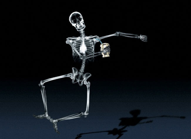 Picture showing a happy skeleton drinking mate