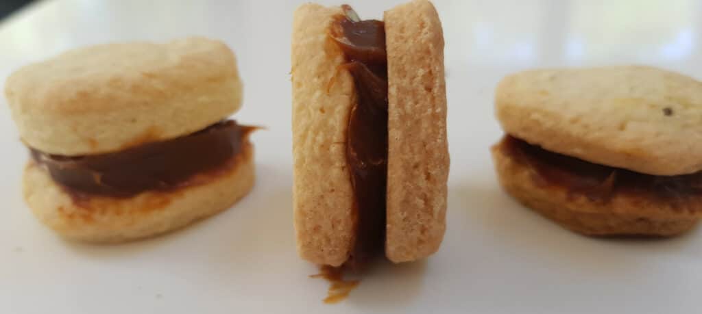 mini heart dulce de leche alfajores being made